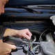 Splicing and soldering the new harness into the original wiring loom